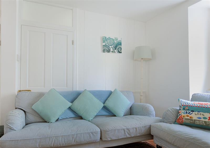 Relax in the living area at Monmouth Cottage, Lyme Regis