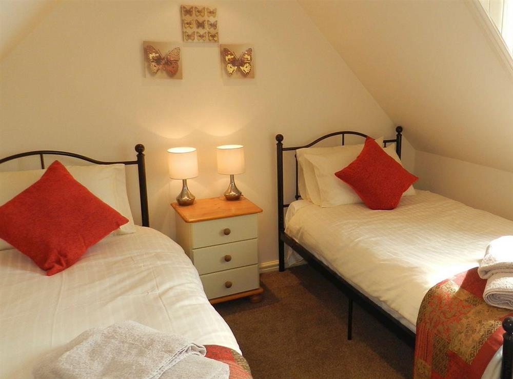 Twin bedroom at Mont Stewart Cottage in Whiting Bay, Isle of Arran, Scotland