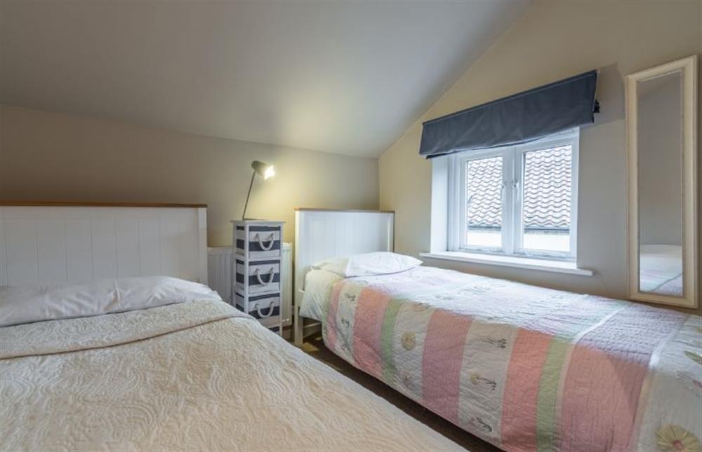 First floor: Twin bedroom at Montgomery Cottage, Docking near Kings Lynn