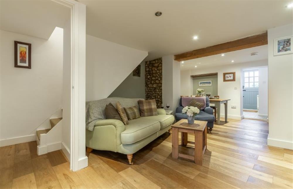 Ground floor: Sitting area with stairs leading off at Montgomery Cottage, Docking near Kings Lynn