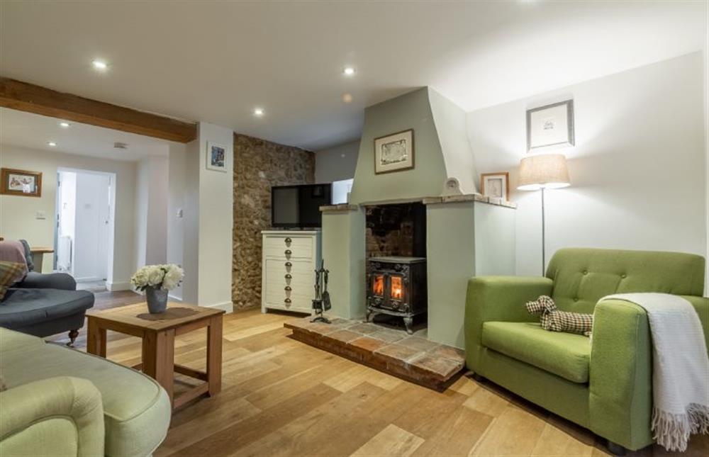 Ground floor:  Sitting room with wood burning stove