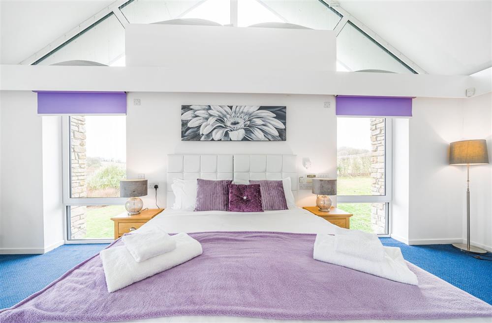 Bedroom one boasts beautiful views across the estate  at Monymusk House, Dorchester