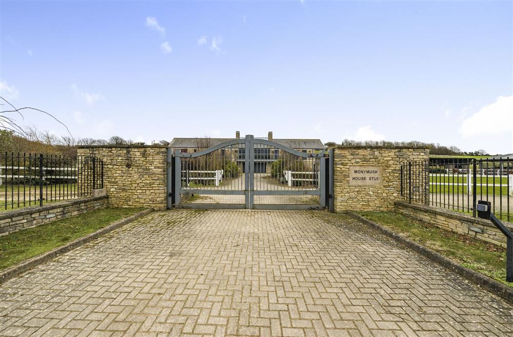 The driveway and electric gates at Monymusk House, Dorchester