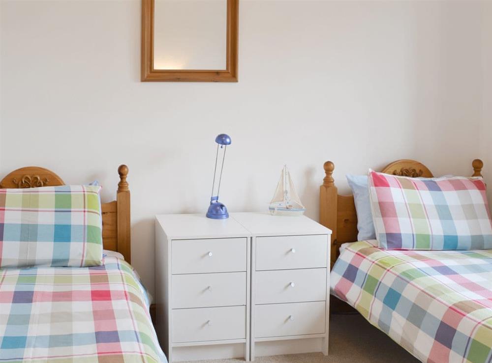 Comfortable twin bedroom at Moon River Cottage in Whitby, North Yorkshire