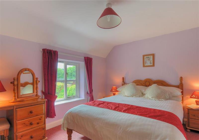 One of the bedrooms at Moonfleet Cottage, Charmouth