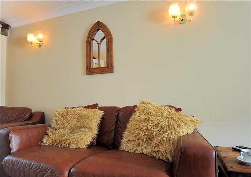 Relax in the living area (photo 2) at Moonfleet Cottage, Charmouth