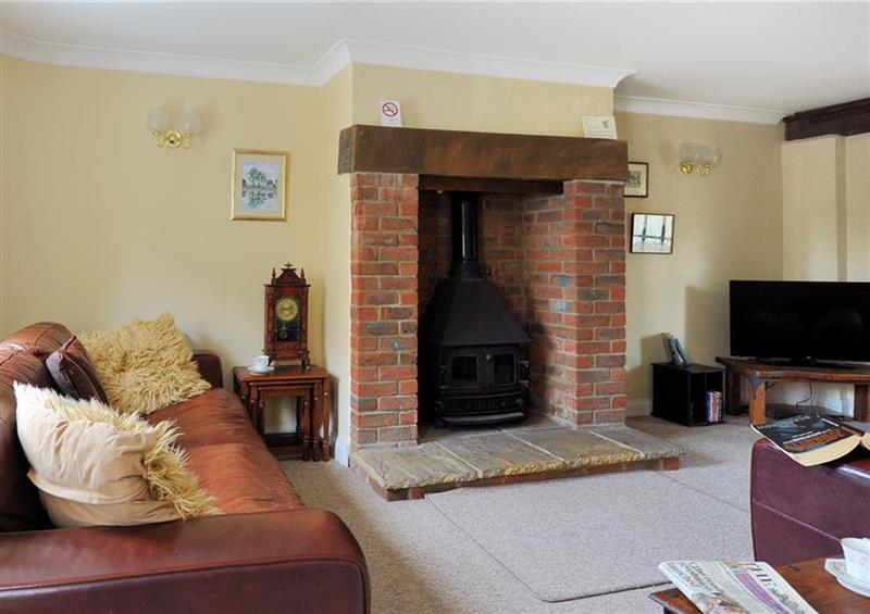 Relax in the living area at Moonfleet Cottage, Charmouth