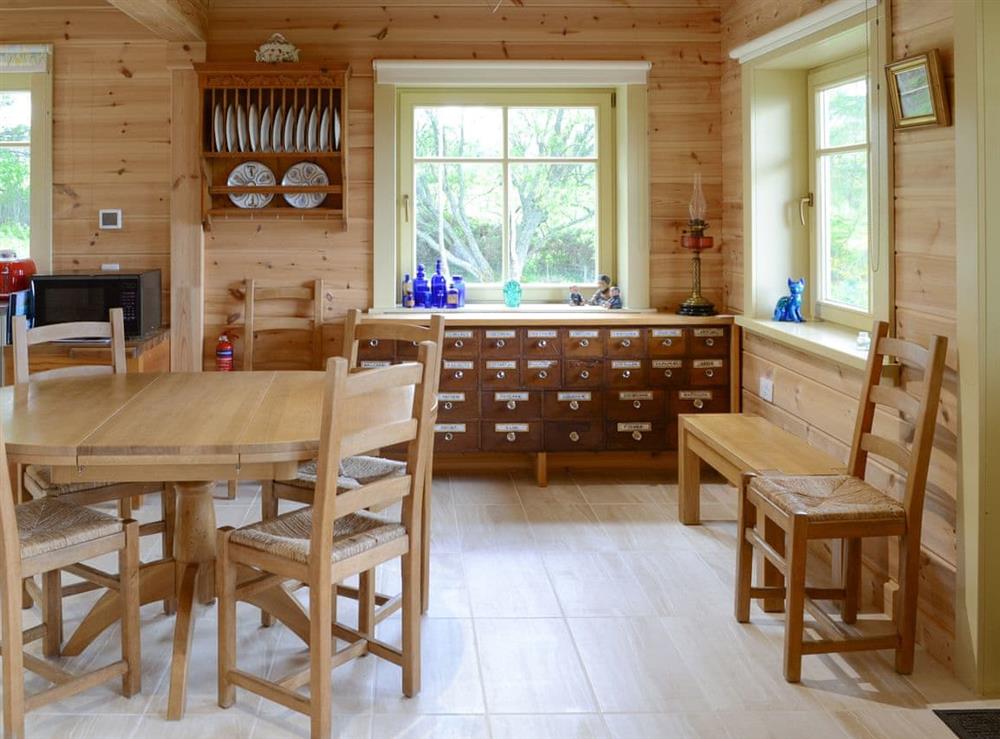 Spacious dining area at Moonshine Cottage in Culbokie, near Dingwall, Ross-Shire