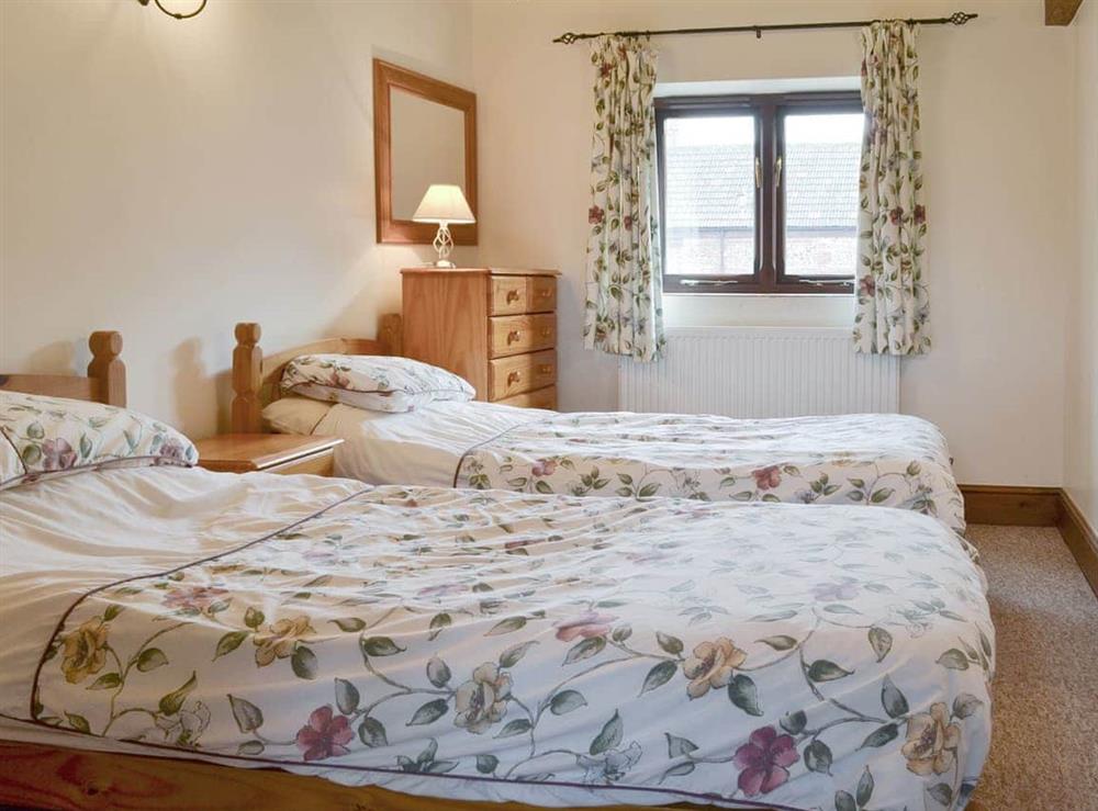 Comfortable twin bedroom at Baileys Barn, 