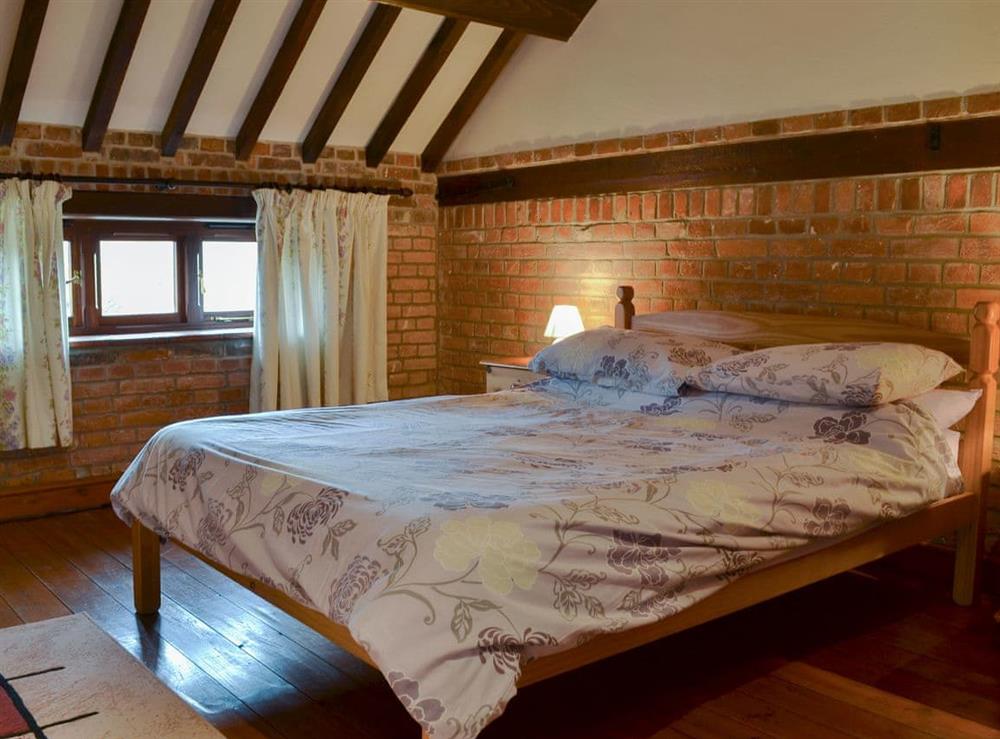 Comfortable double bedroom at Church Farm Barn, 