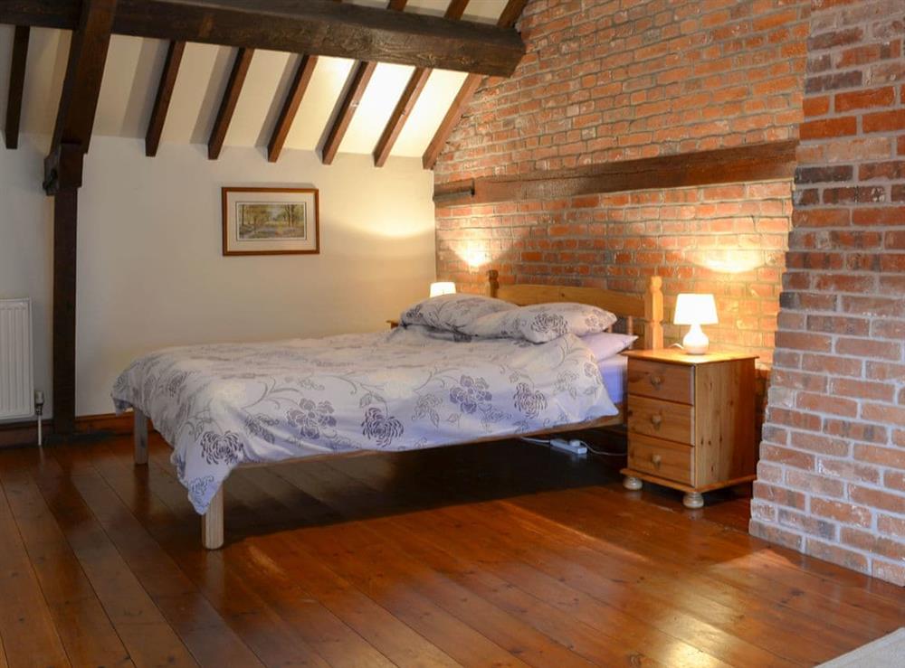 Spacious double bedroom at Church Farm Barn, 