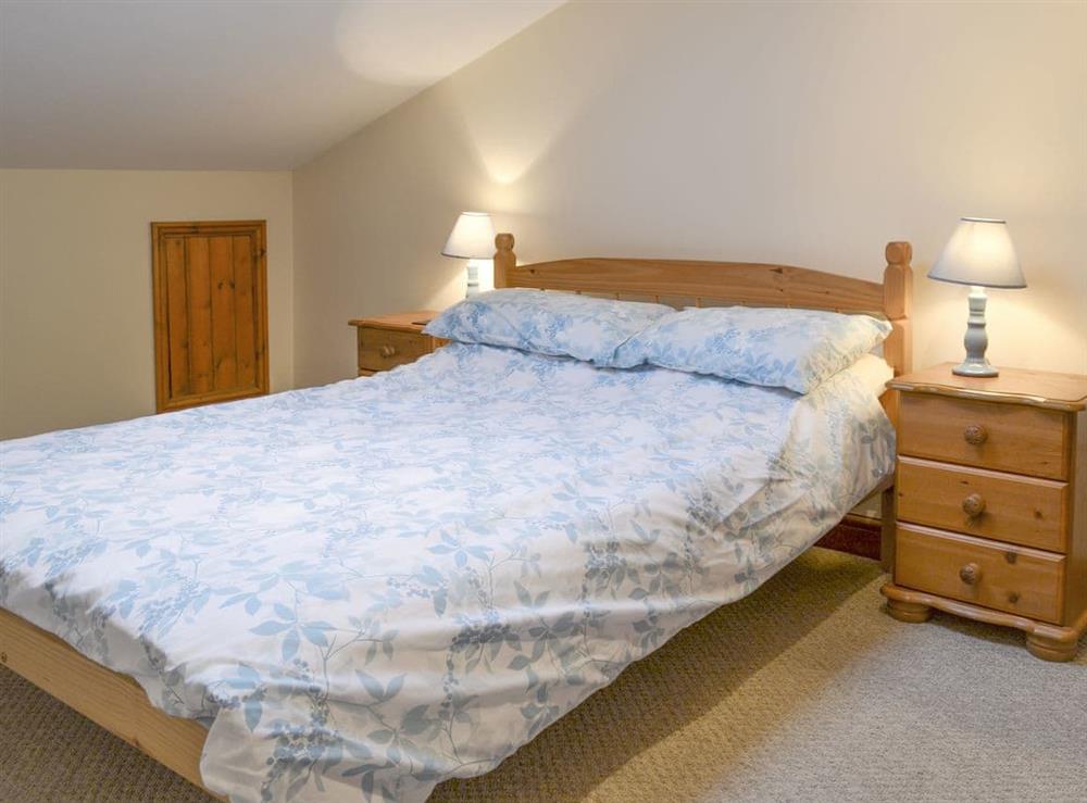 Relaxing double bedroom at Dairy Cottage, 