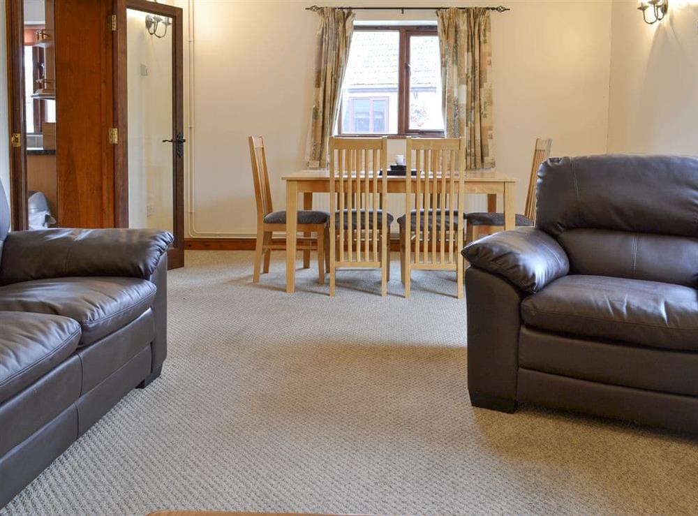 Spacious living and dining room at Dairy Cottage, 