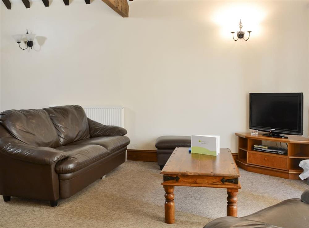 Welcoming living area at Littlewoods Barn, 