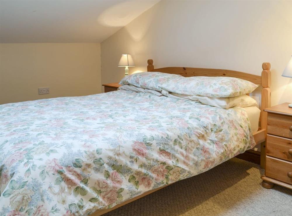 Relaxing double bedroom at Pond Cottage, 