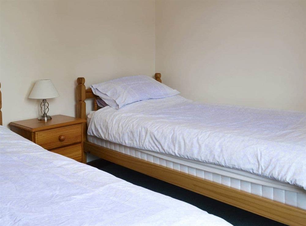 Comfortable twin bedroom at Stable Cottage 6, 