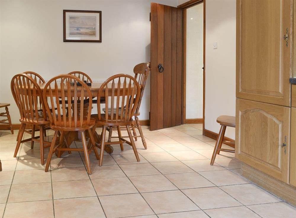 Convenient dining area within kitchen at The Old Workshop, 
