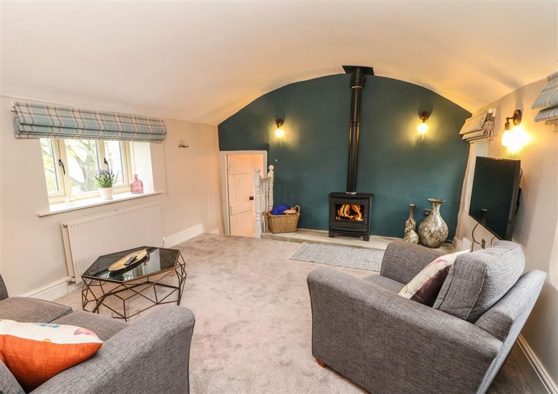 Enjoy the living room at Moor House Farm Cottage, Stocksbridge