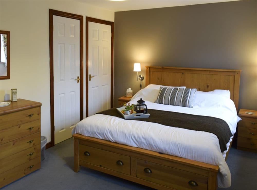 Bedroom with kingsize bed at Moordale Cottage in Reeth, near Richmond, North Yorkshire