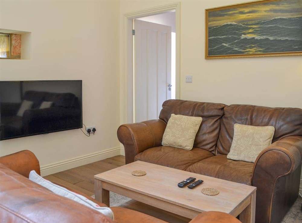 Open plan living space at Moorhen Cottage in Staithes, North Yorkshire