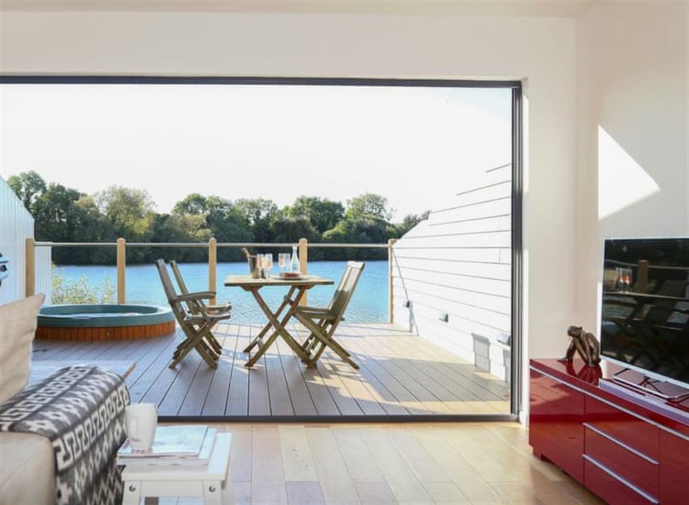Living area at Moorhen Lake House in Cotswold Lakes, Gloucestershire