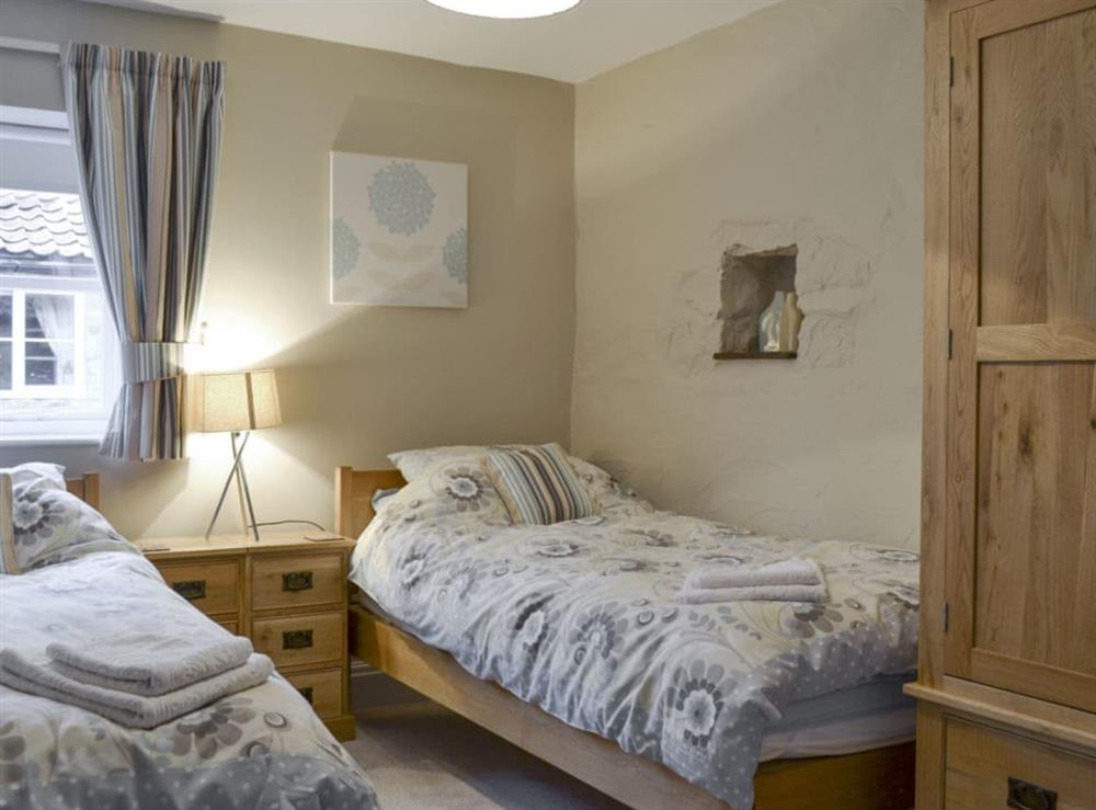 Relaxing twin bedroom at Moorland Cottage in Hutton-le-Hole, near Kirkbymoorside, North Yorkshire