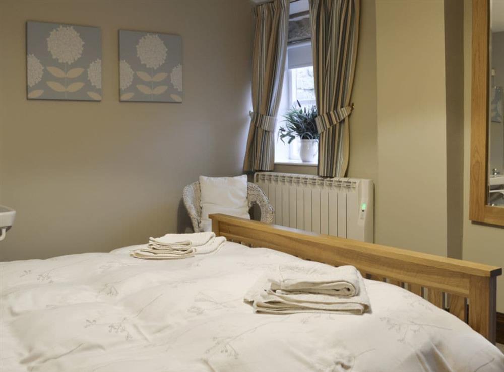 Stylish double bedroom at Moorland Cottage in Hutton-le-Hole, near Kirkbymoorside, North Yorkshire