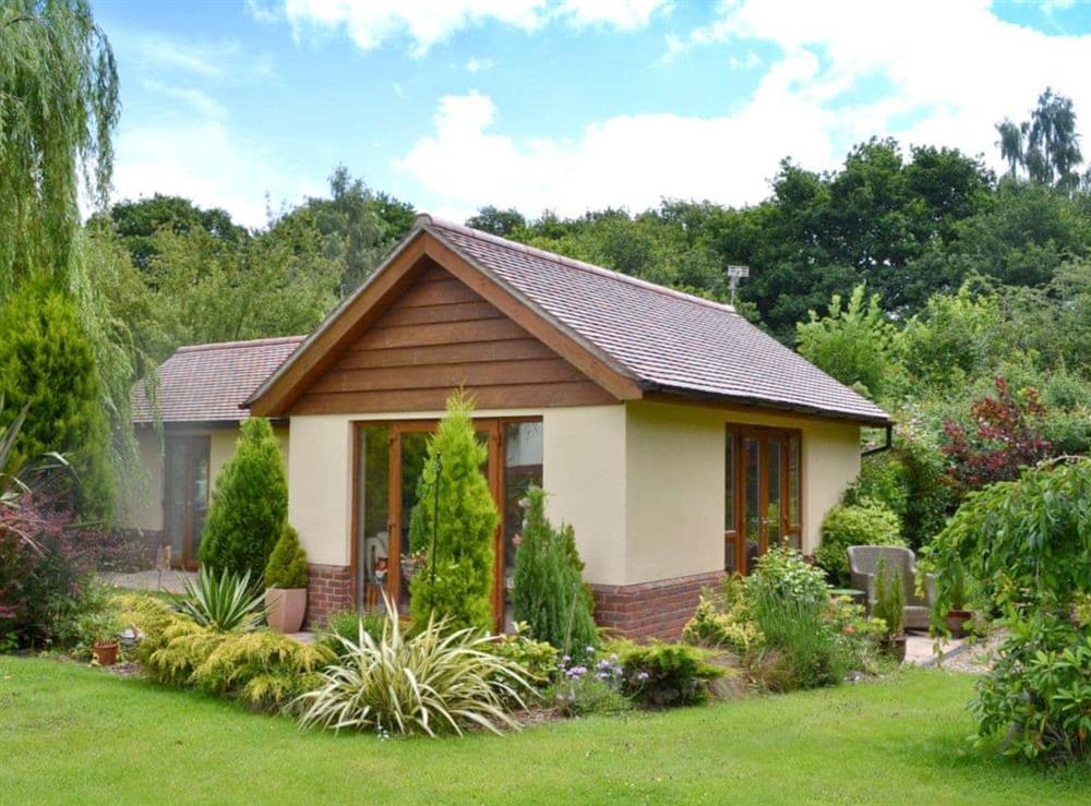 Pretty property set in delightful garden at Moorland Lodge in Holt Wood, near Wimborne, Dorset