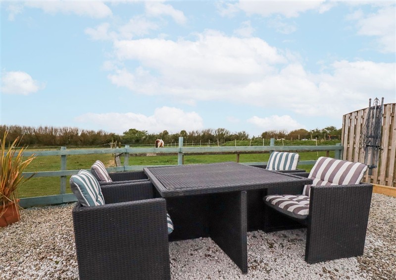 Enjoy a glass of wine on the patio at Moorland View, Belowda near Roche