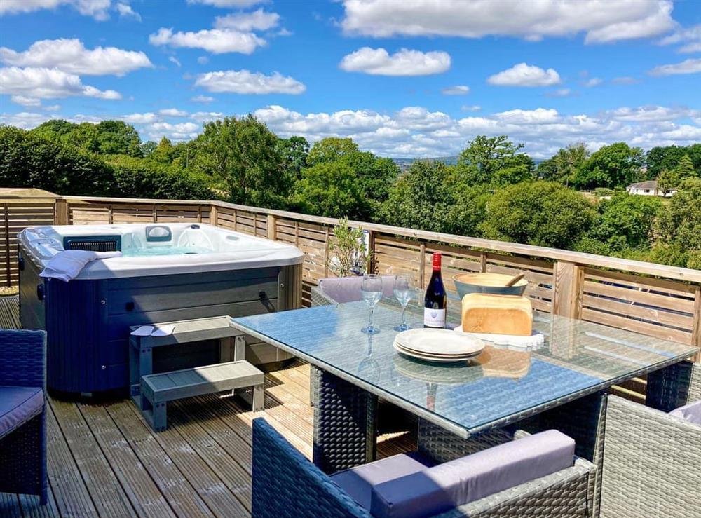 Terrace with hot tub at Moorland Views 2 in Newton Abbot, Devon