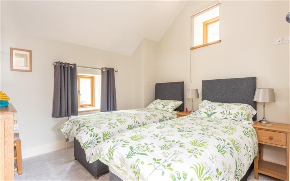 Bedroom 2 with twin beds at Moorlands Barn in Belstone