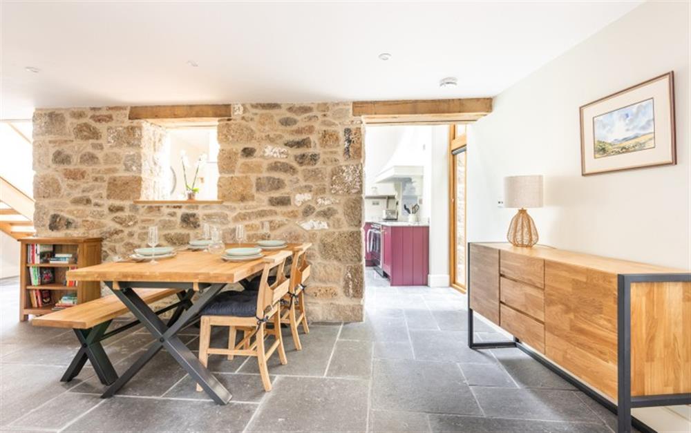 Dining area with table and seating for 4 at Moorlands Barn in Belstone