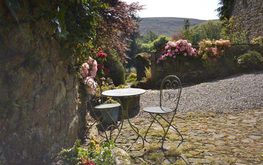 Enjoy the sunny cobbled courtyard.