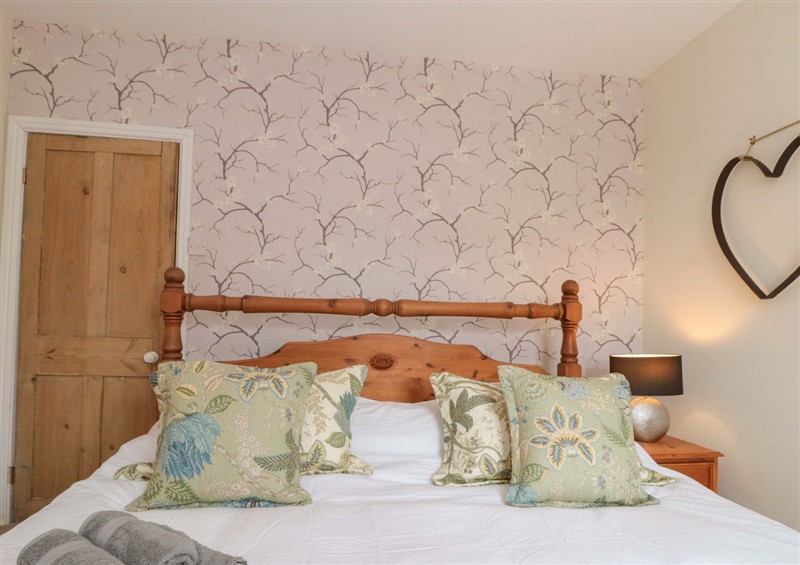 A bedroom in Moot Cottage at Moot Cottage, Driffield