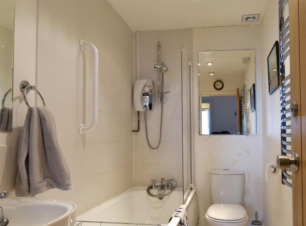 Family bathroom with shower over bath at Flat 3 Sea View, 