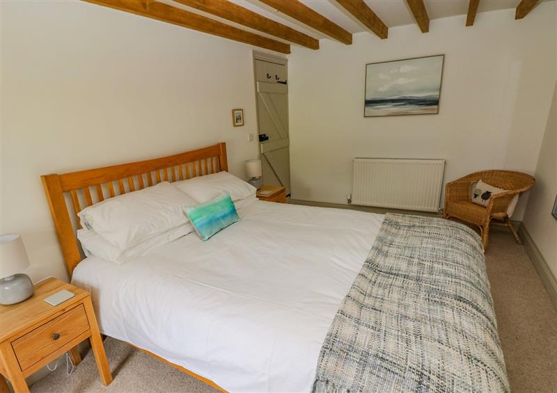 A bedroom in Morlan Cottage at Morlan Cottage, Newport