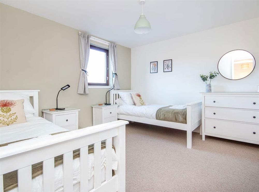 Twin bedroom at Morlich Court in Aviemore, Inverness-Shire