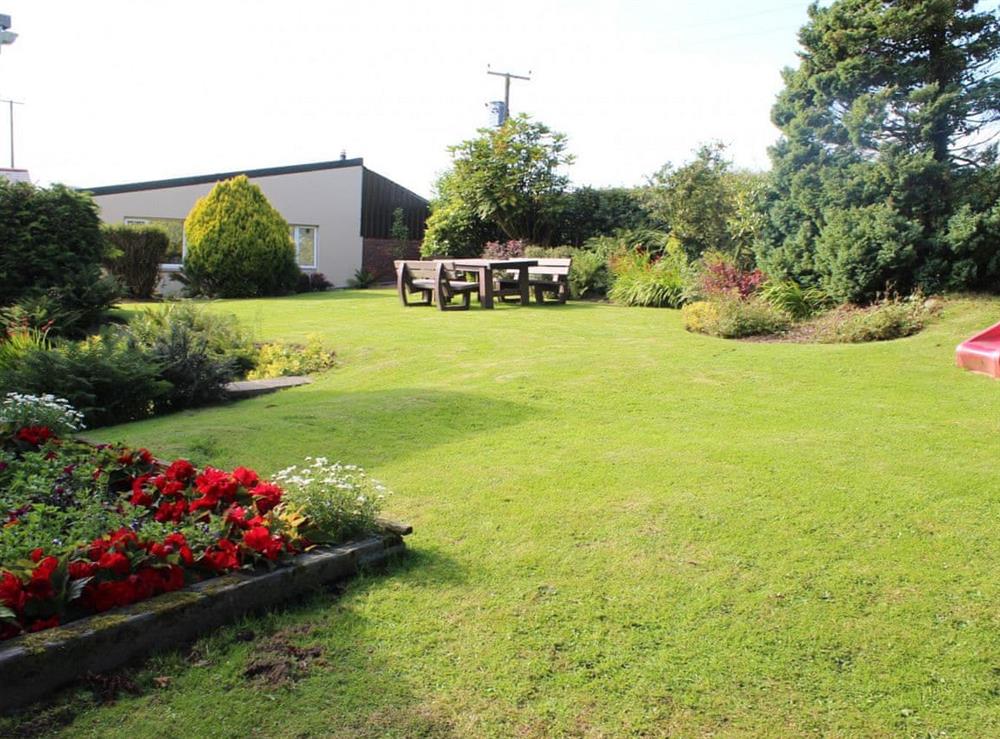 Well-maintained shared gardens at The Carthouse, 