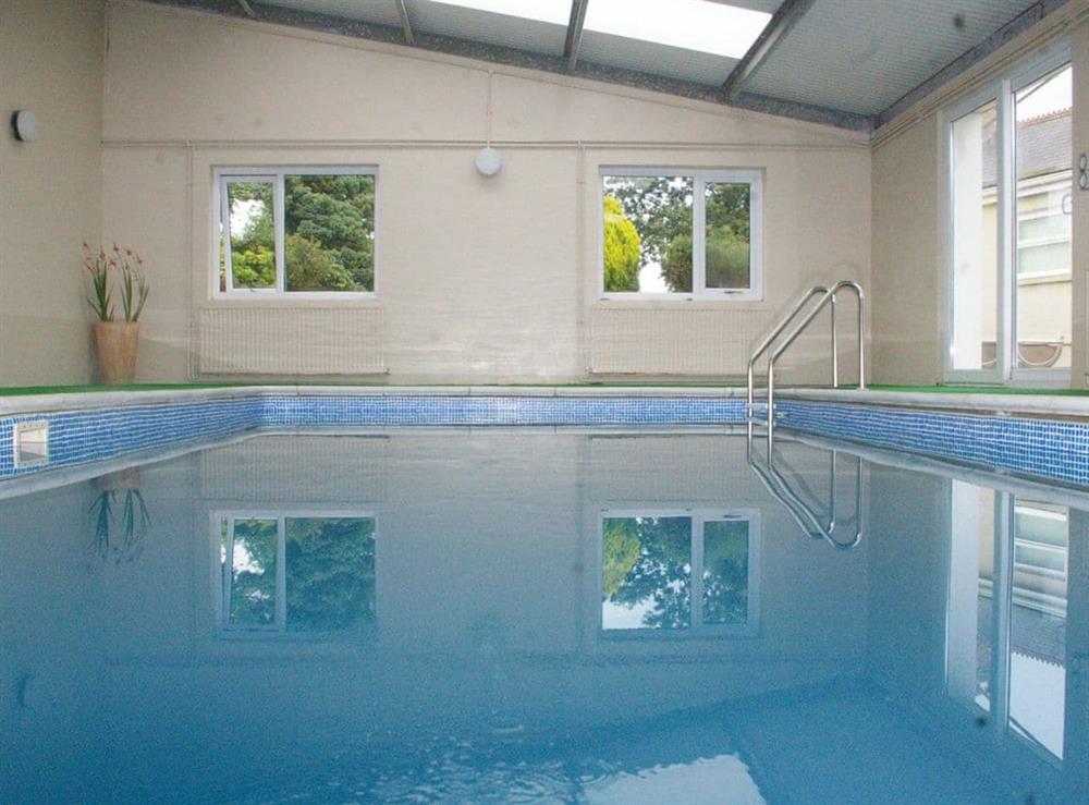 Shared indoor swimming pool at The Farmhouse, 