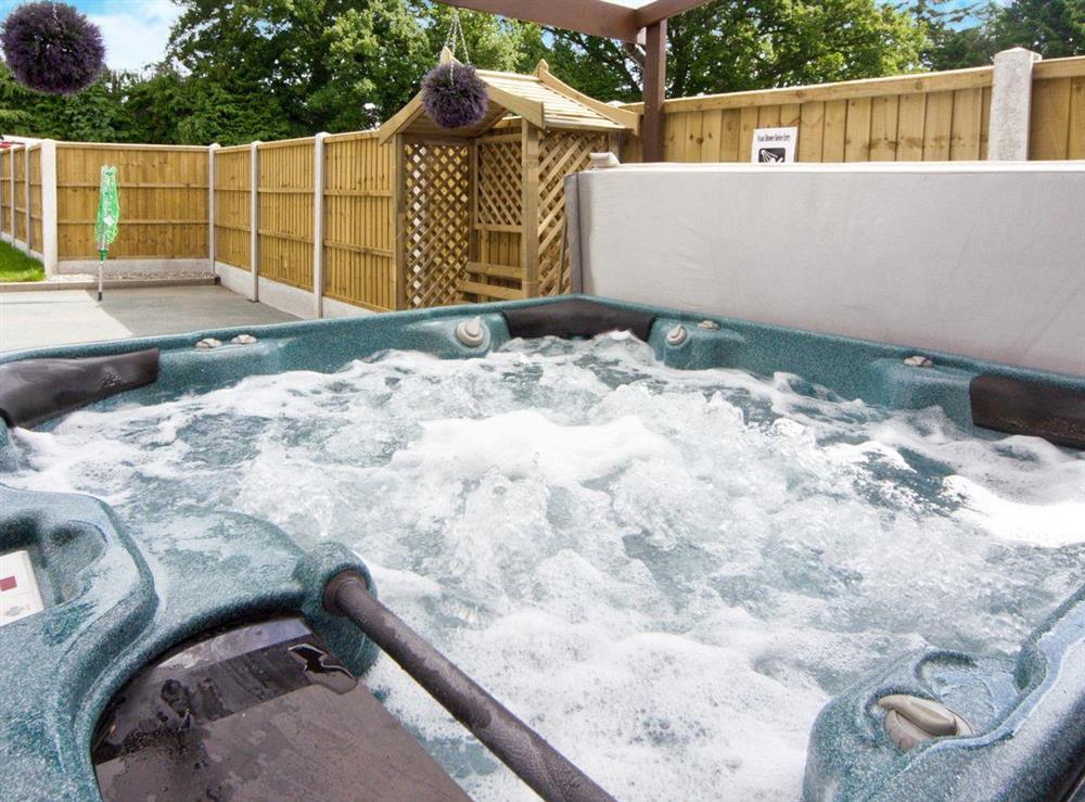 Relaxing hot tub at Morton Grange Coach House in Ellesmere, Shropshire