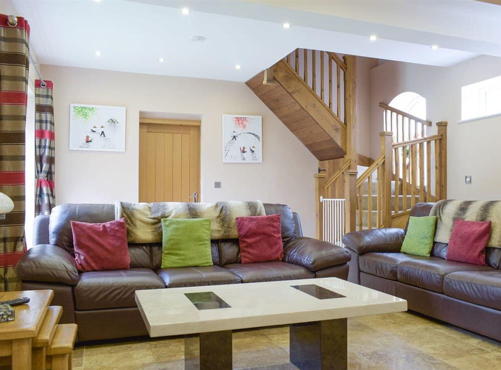 Spacious living room at Morton Grange Coach House in Ellesmere, Shropshire
