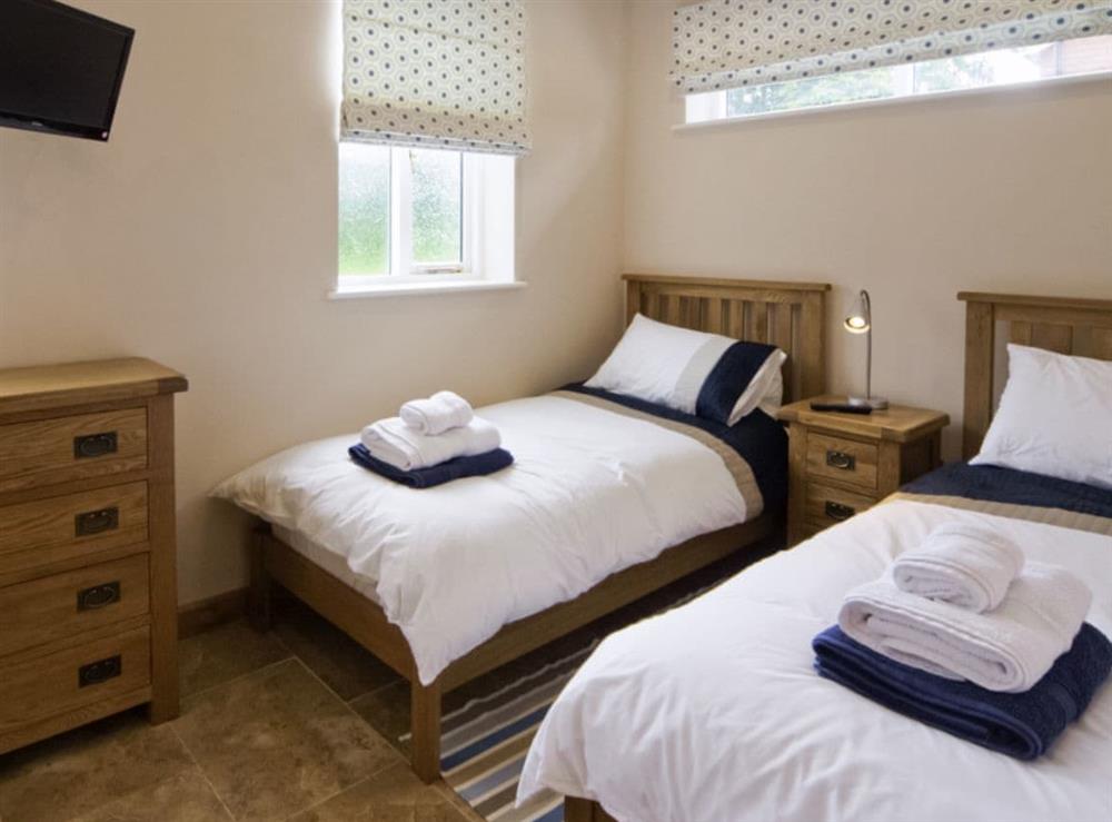 Twin bedroom at Morton Grange Coach House in Ellesmere, Shropshire
