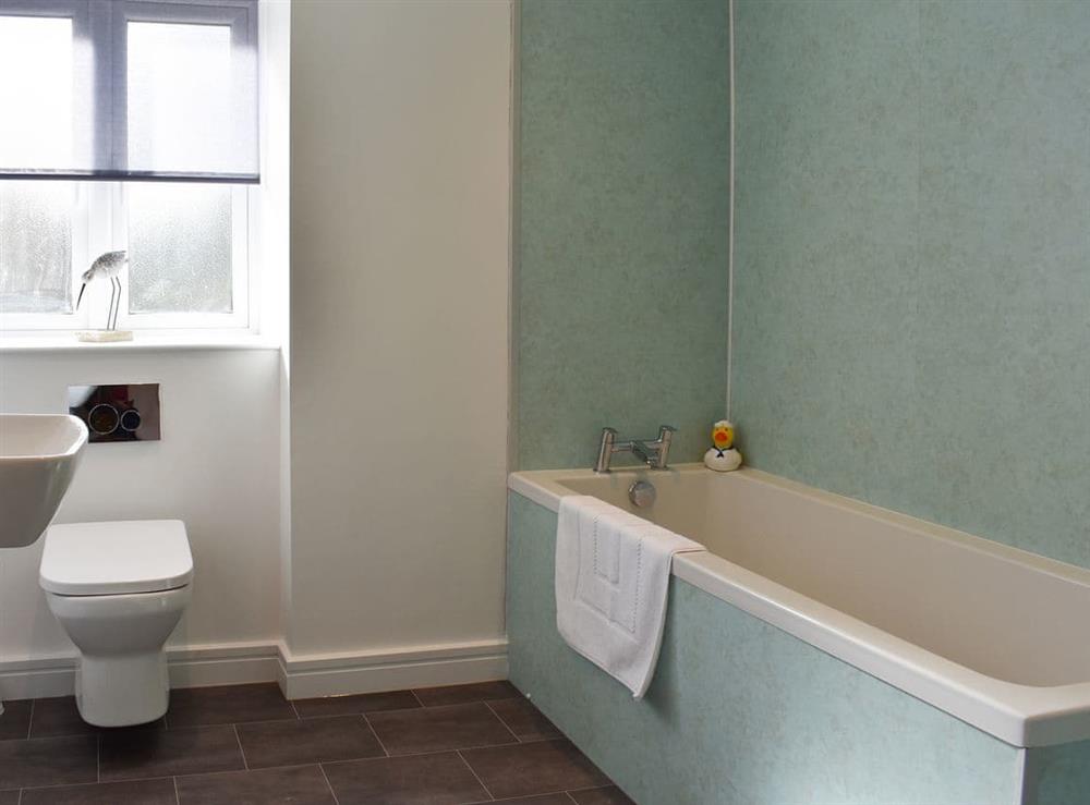 Bathroom with bath and shower cubicle at Bull Pen, 