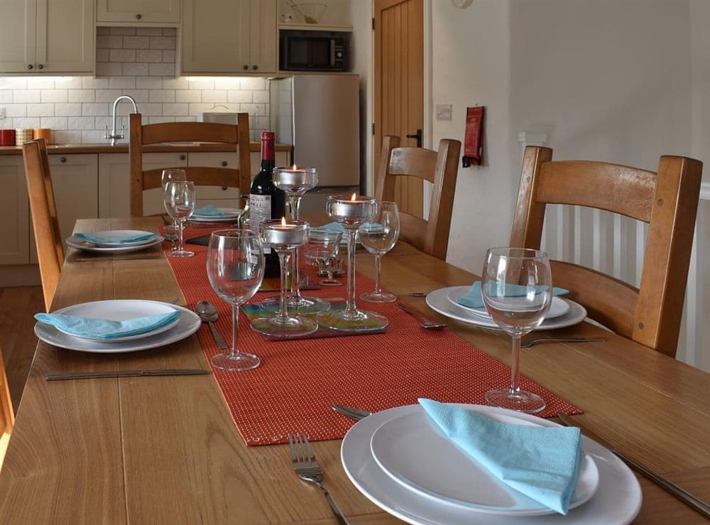 Lovely farmhouse style dining table and chairs at Bull Pen, 