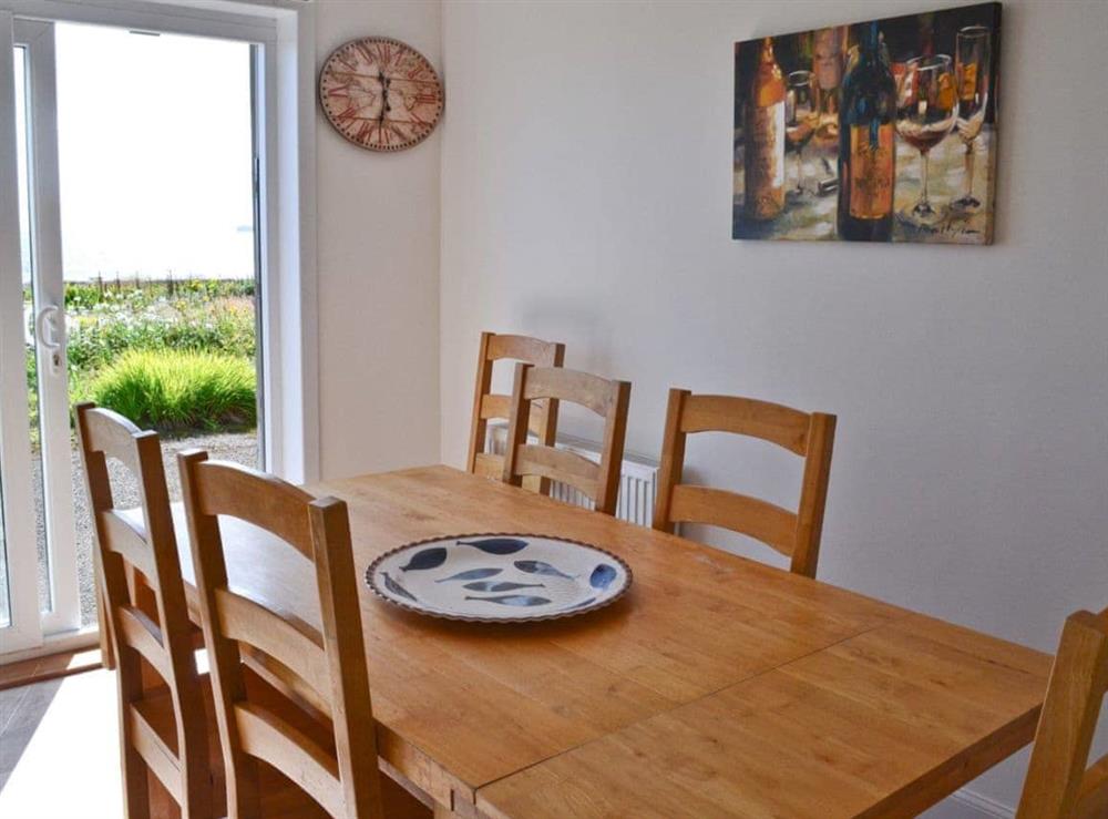 Dining area at Morys Cottage in Keiss, near Wick, Caithness