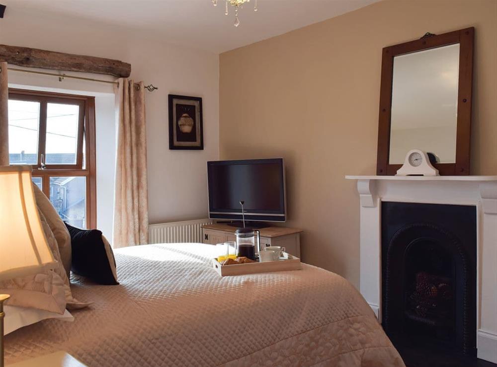 Comfortable double bedroom (photo 2) at Moss Cottage in Burry Port, near Llanelli, Carmarthenshire, Dyfed