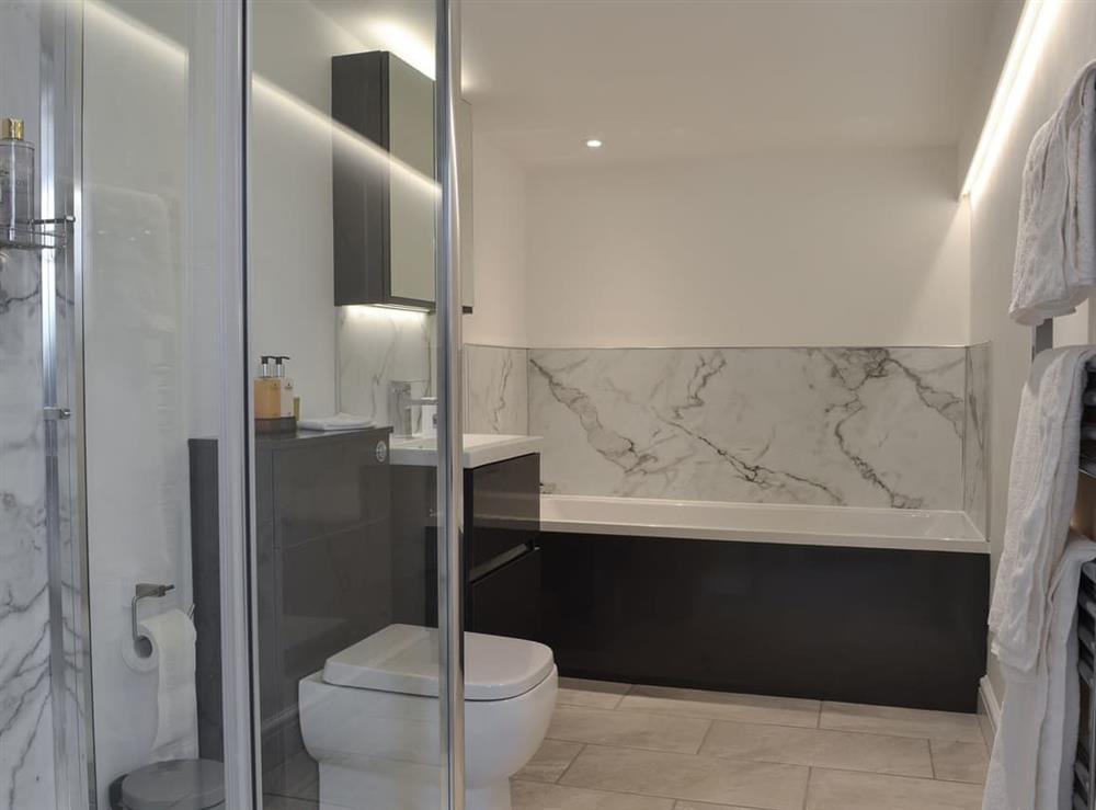 Bathroom with separate shower at Moss Hall Barn in Rushton, near Tarporley, Cheshire