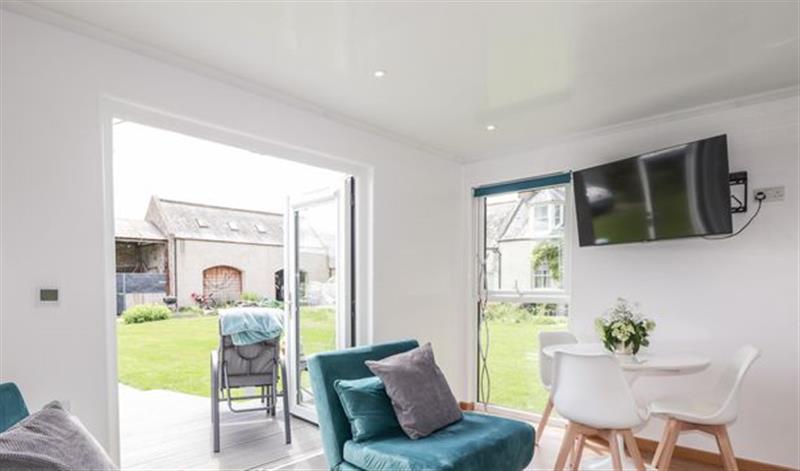 Relax in the living area at Moss of Bourach, Aberlour