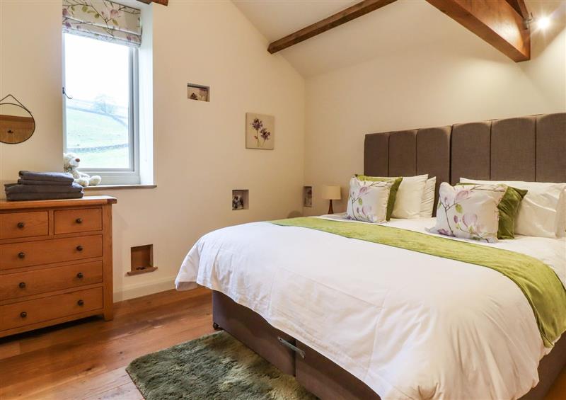 A bedroom in Mosscarr Barn at Mosscarr Barn, Pateley Bridge