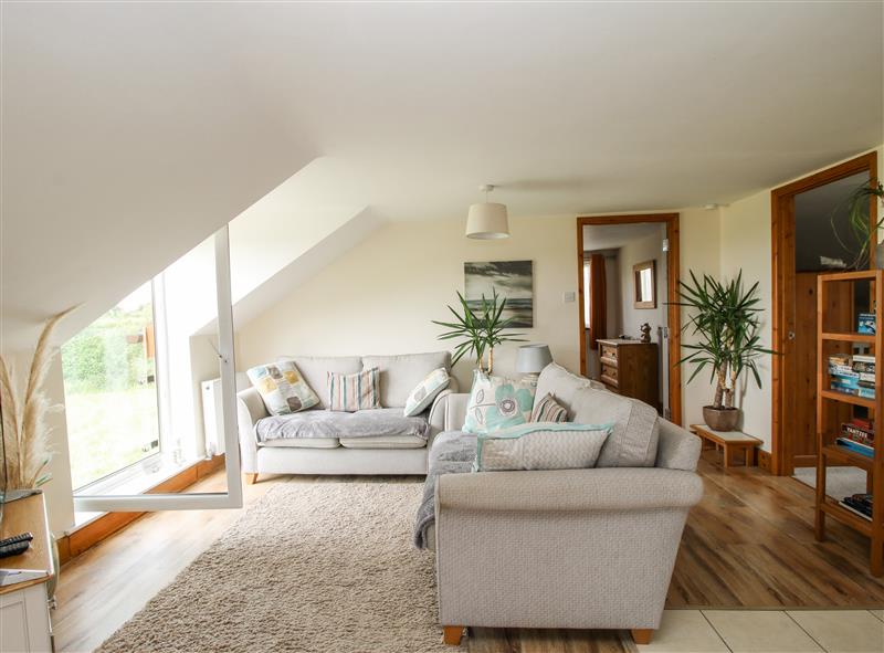 Relax in the living area at Mossy Lodge, Hemford near Minsterley